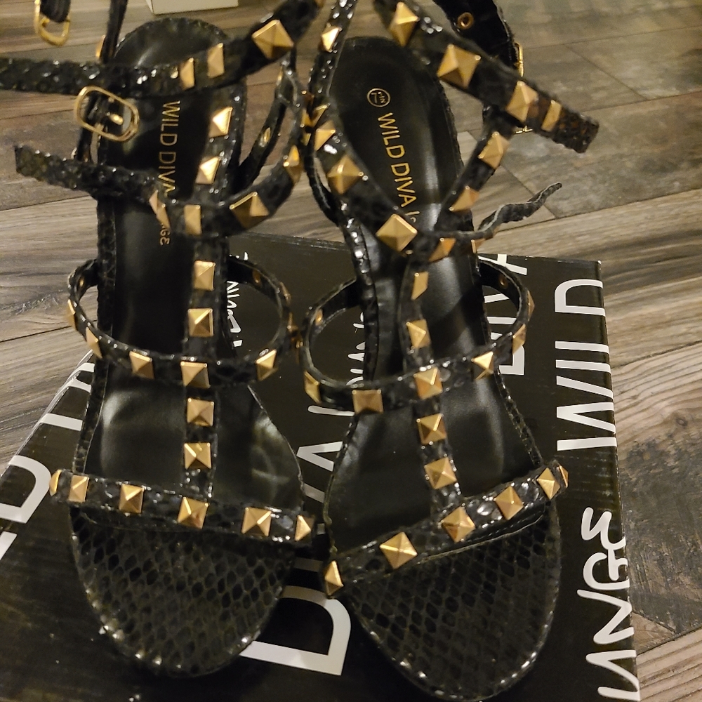 Wild diva black studded here. Brand new. In box. 7.5